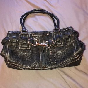 A black leather purse